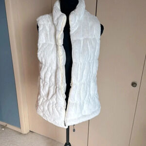 Fluffy furry white vest.